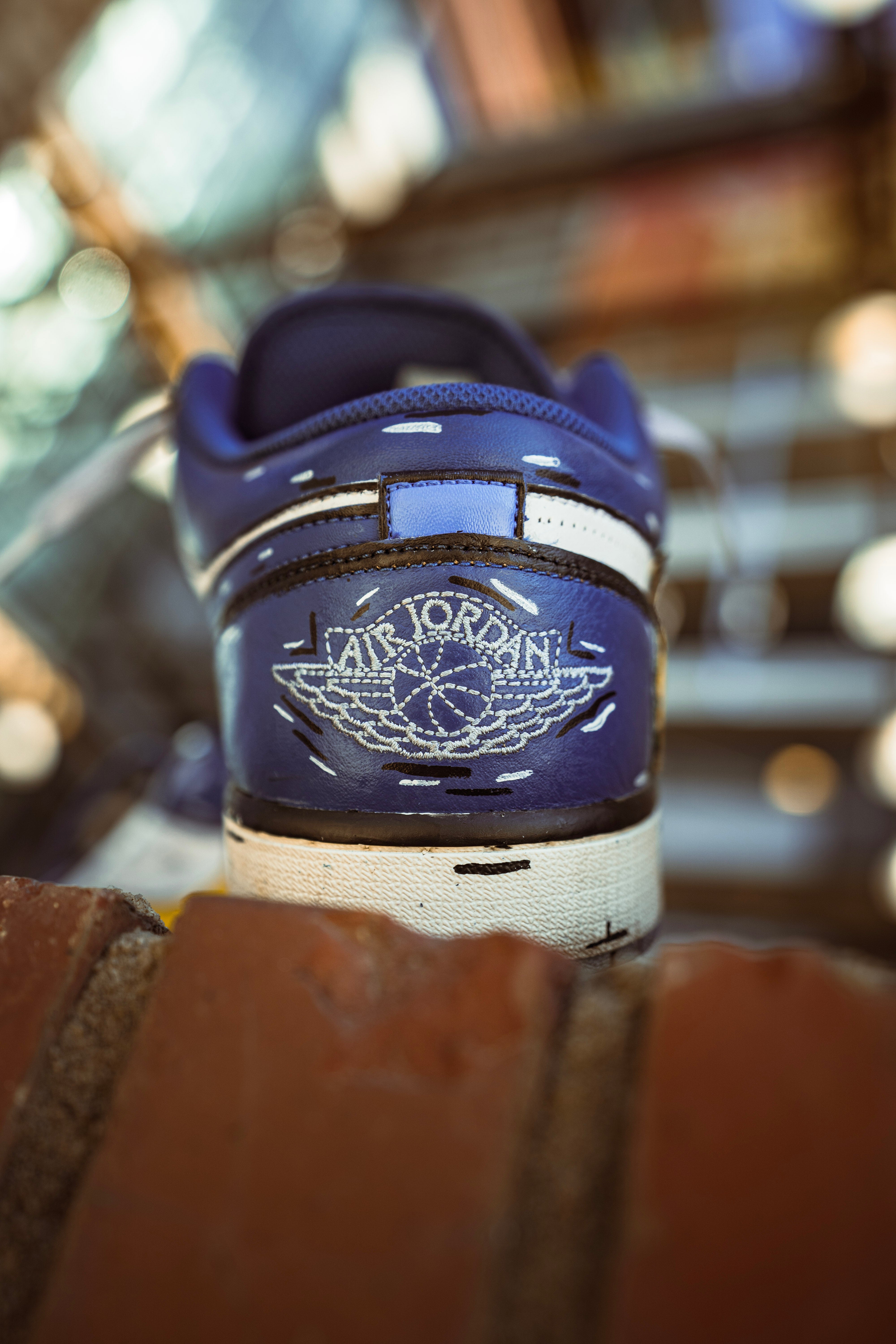 Cartoon Reverse Swoosh Jordan 1 Low